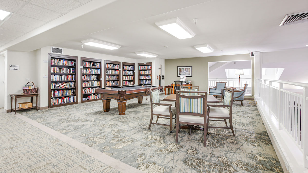 The library at Salmon Creek with shelves of books and comfortable seating